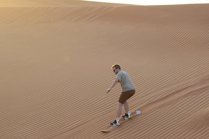 Desert Safari Tour, Quad Bike with BBQ Dinner & Show from Dubai - Tanoura, belly dancing, and the fire show