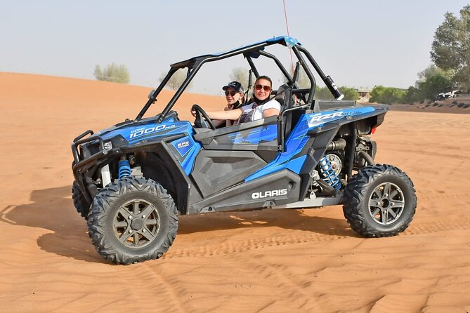 Desert Safari With 30 Mins Of Quad Bike Tour Camel Ride And BBQ - Dune bashing on the 30-minute red-dune route