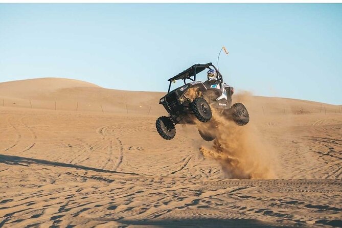 Desert Safari with 30 minutes Buggy Ride with Camel Ride & Dinner - Pickup in an air-conditioned 4x4
