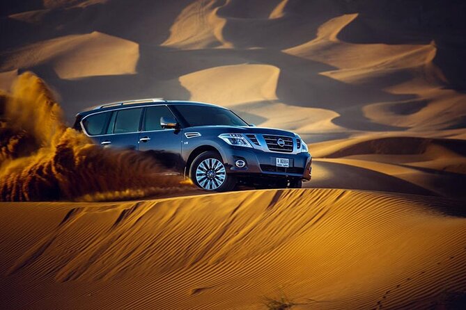 Desert Safari with BBQ Dinner, Camel Ride, Sand Board & Live Show - From Dubai pickup to the Lahbab dunes