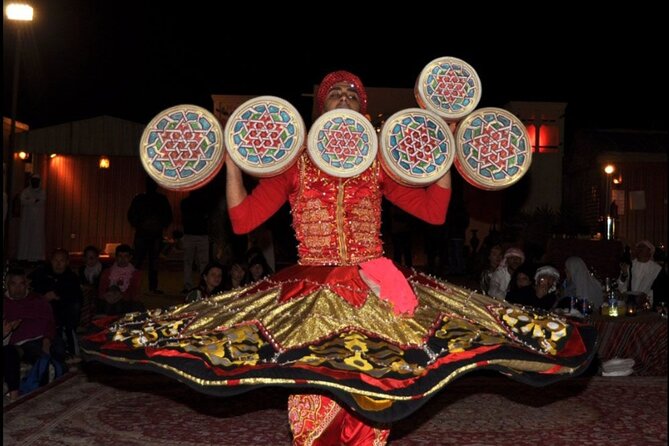 Desert Safari with BBQ Dinner, Camel Ride, Sand Board & Live Show - What the $40 price really covers