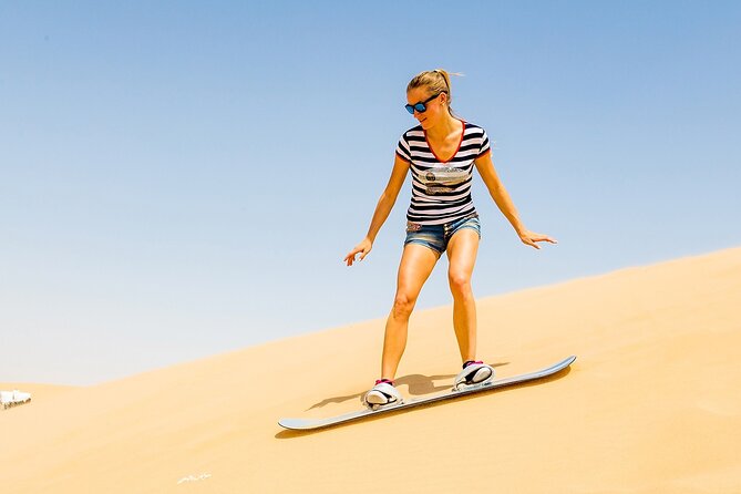 Desert Safari with BBQ Dinner, Camel Ride, Sand Board & Live Show - A practical ten-minute pause in Lahbab
