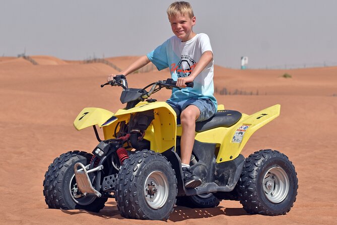 Desert Safari With BBQ Dinner, Quad Bike & Camel Ride from Dubai - Camel riding, sandboarding, falcons, and Arabic welcomes