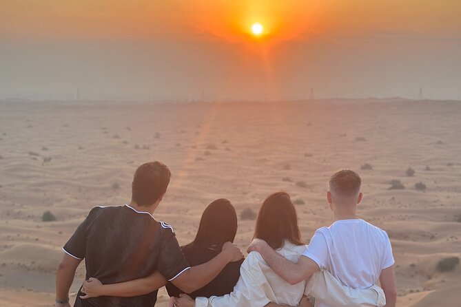 Desert Safari With BBQ Dinner, Quad Bike & Camel Ride from Dubai - Henna, belly dancing, and fire under the stars