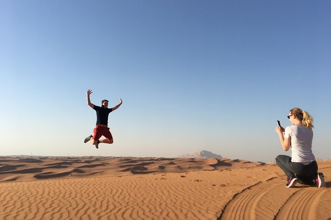 Desert Safari with BBQ Dinner (Sharing/Private) - Sandboarding gives you time on the sand