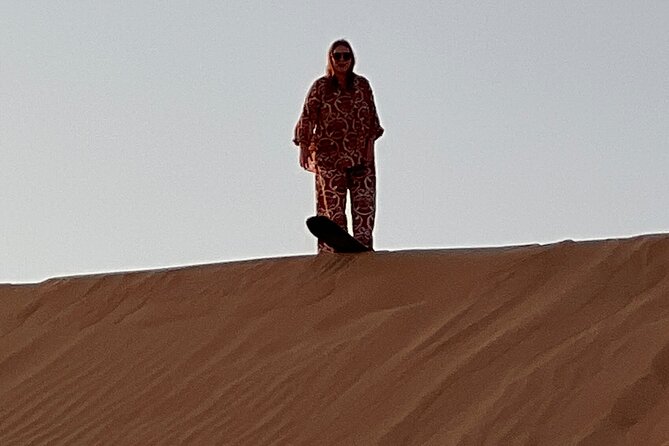 Desert Safari with Dune Bashing and Camel Ride plus Sand Boarding - Camel riding: brief, traditional, and easy to fit in
