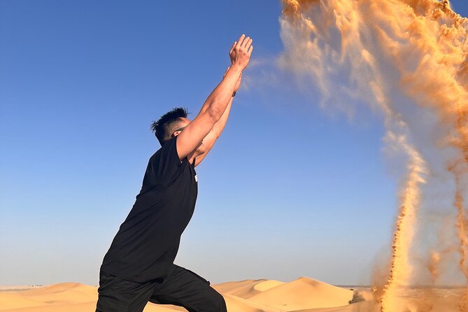 Desert Safari with Dune Bashing and Camel Ride plus Sand Boarding - Sand boarding for a simple burst of fun