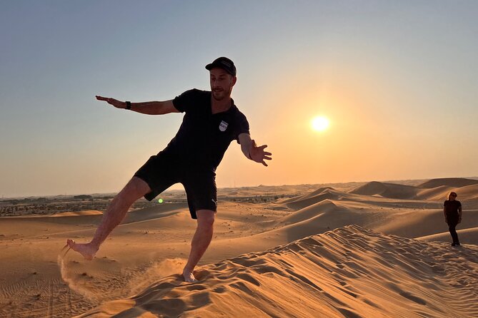 Desert Safari with Dune Bashing and Camel Ride plus Sand Boarding - Henna, falcon photographs, and traditional dress