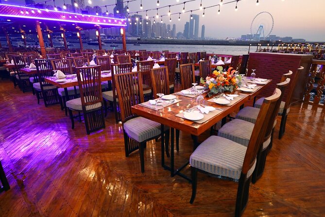 Dhow Cruise Dinner Marina - Boarding a traditional dhow in a modern marina