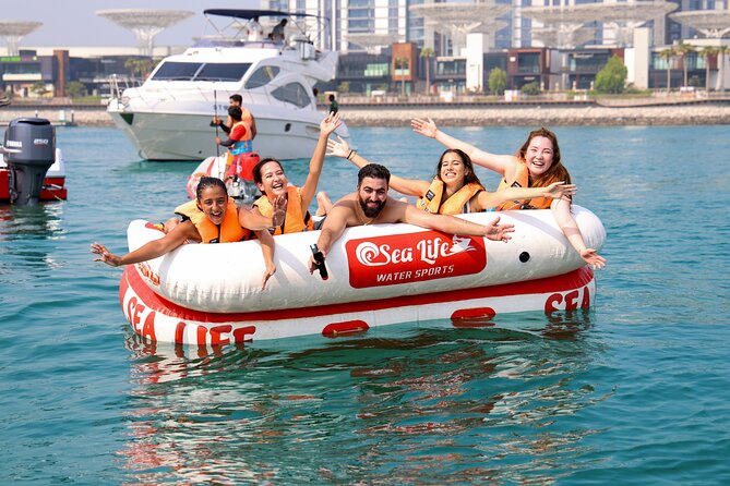 Donut or Sofa Boat Ride Watersport Tour Package in Dubai - Photos, videos, and Dubai views
