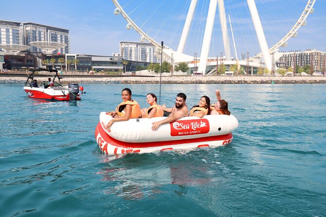 Donut or Sofa Boat Ride Watersport Tour Package in Dubai - Arriving at Dubai Harbour and Dubai International Marine Club