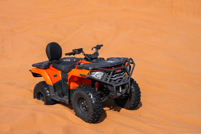 Dubai 4-5 hours Private Quad Bike Tour, Camel Ride and Softdrinks - Quad biking across the dunes