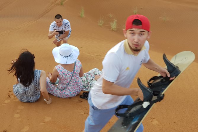 Dubai 4x4 Desert Safari, Quad Bike, Camel Ride & BBQ Dinner - Sunset photos, camel riding, and the pace of the stop