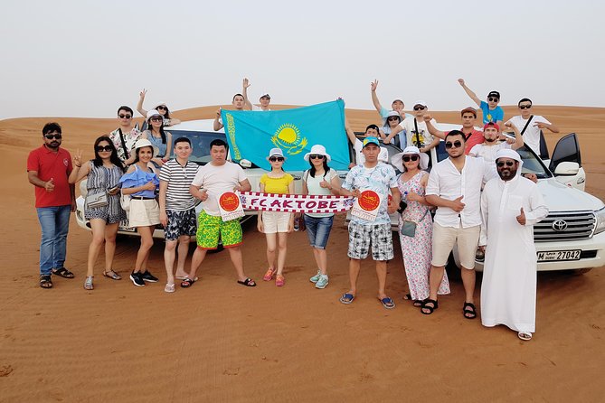 Dubai 4x4 Desert Safari, Quad Bike, Camel Ride & BBQ Dinner - Tanoura, fire, and ladies belly dance shows