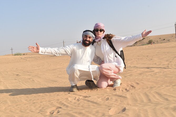 Dubai: 60Minute Self-Drive ATV Quadbike, Camel Ride, Sand Surfing - Camel riding adds a slower desert moment