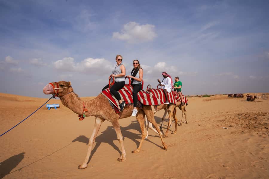 Dubai: Adventure Quad Bike Safari, Camel Ride & Refreshment - Leaving Dubai for the open desert