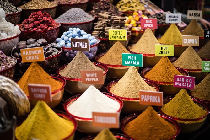 Dubai Aladdin Tour: Souks, Creek, Old Dubai and Tastings - Crossing the creek by abra