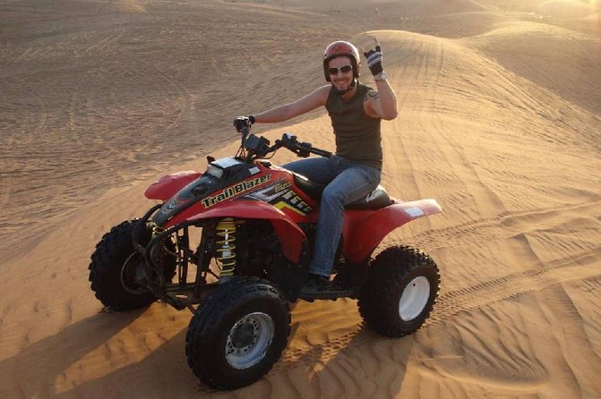 Dubai: ATV Ride and Desert Safari Drive (Morning Adventure) - Camel riding, sandboarding, and the first desert stop
