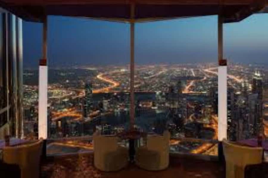 Dubai: Burj Khalifa Sunset Engagement with Porsche Pickup - Flowers, perfume, and the ride home