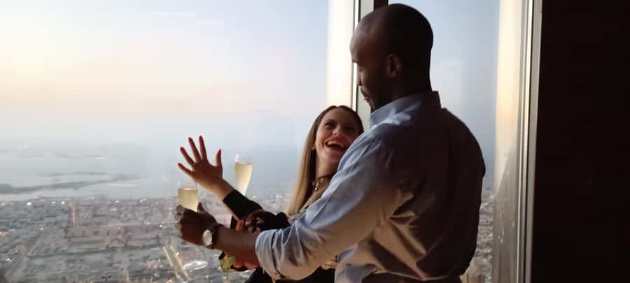Dubai: Burj Khalifa Sunset Engagement with Porsche Pickup - A 3:45 PM Porsche pickup sets the tone
