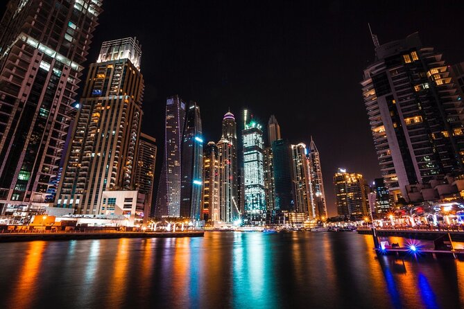 Dubai by Night City Tour - Passing the Dubai Frame, Glow Park, and DIFC
