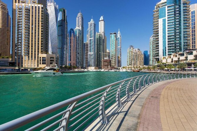 Dubai City Tour - The History from Riding Camel to Riding Ferrari - Dubai Marina brings the modern city into focus