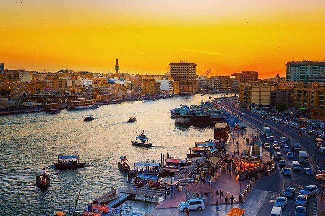 Dubai City Tour - The History from Riding Camel to Riding Ferrari - Cross Dubai Creek by abra