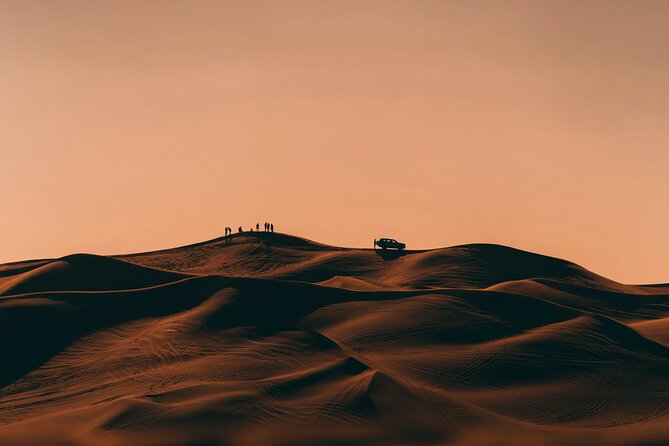 Dubai City Tour with Desert Safari, Camel Ride, Dune Bashing & BBQ - Leaving the city for Lahbab