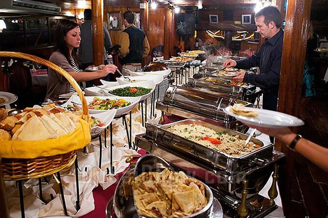 Dubai Creek Dhow Dinner Cruise - Music and Live Entertainment on Board