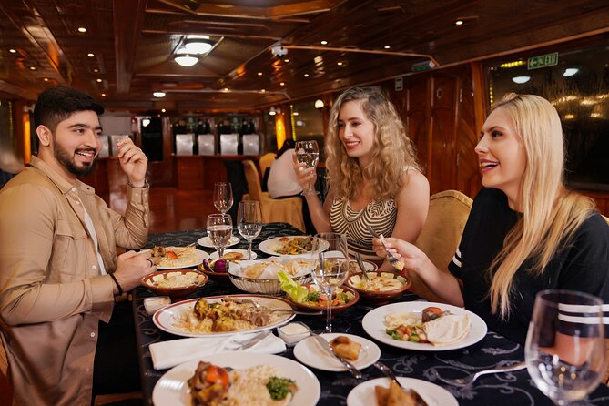 Dubai Creek Luxury Dhow Dinner Cruise with Optional Transfer - Boarding a traditional-style dhow