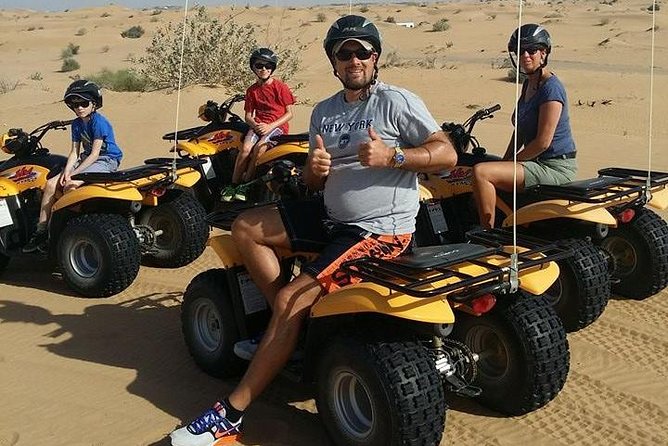 Dubai Desert Afternoon Quad Safari with Camel Ride, BBQ Dinner and Belly Dancing - Leaving Dubai for the open sand