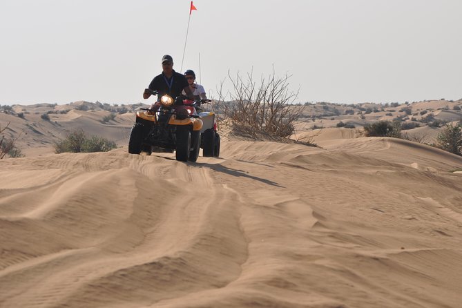 Dubai Desert Afternoon Quad Safari with Camel Ride, BBQ Dinner and Belly Dancing - Weather is the biggest risk