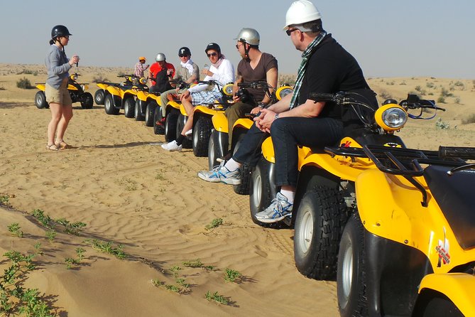 Dubai Desert Afternoon Quad Safari with Camel Ride, BBQ Dinner and Belly Dancing - The quad-bike ride is the real centerpiece