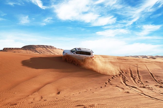 Dubai Desert Bespoke: Red Dunes Safari, Camel Ride & BBQ Options - The 25-minute desert meeting point