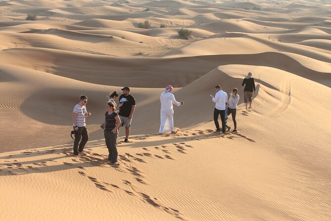 Dubai Desert Bespoke: Red Dunes Safari, Camel Ride & BBQ Options - Belly dancing and Tanura after dark