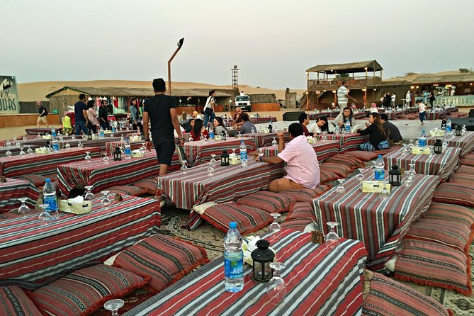 Dubai: Desert Camel Ride with Live Shows & BBQ Buffet Dinner - Arriving at the Bedouin-style camp