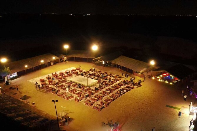 Dubai: Desert Camel Ride with Live Shows & BBQ Buffet Dinner - BBQ dinner under the evening sky