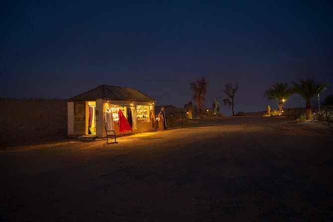 Dubai Desert Camp Dinner with BBQ, Dinner, Camel Ride & Shows - Belly Dancing, Tanura, and the Fire Show