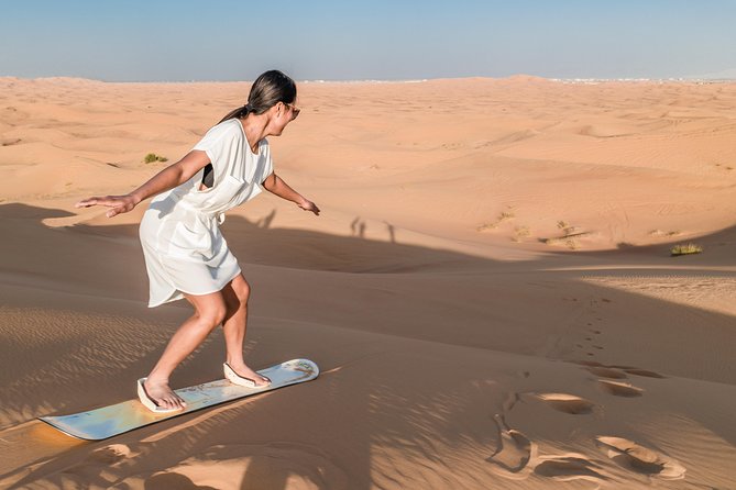 Dubai Desert Discovery: Red Dunes Safari, Sandboard & Camel Ride - From Dubai hotels to the Lahbab desert