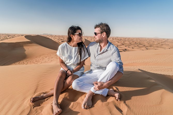 Dubai Desert Discovery: Red Dunes Safari, Sandboard & Camel Ride - Optional quad biking before the main ride