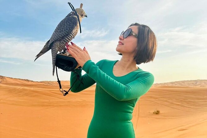 Dubai Desert Escape: Red Dunes Safari, Falcon, Camel & BBQ Dinner - Meeting a falcon, a symbol of Emirati culture