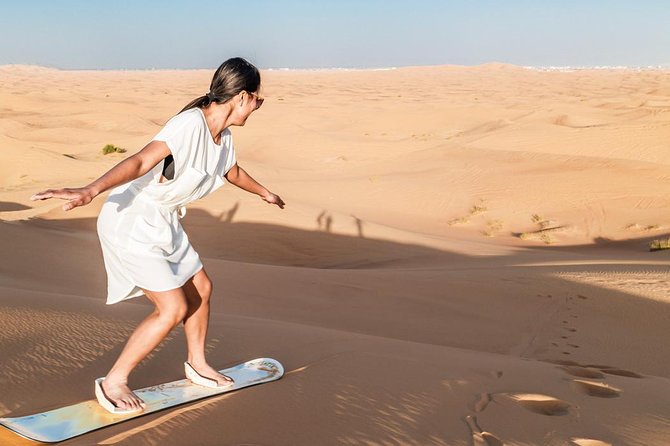 Dubai Desert Journey: Red Dunes Safari with BBQ in Bedouin Camp - BBQ buffet, Tanura, belly dancing, and fire