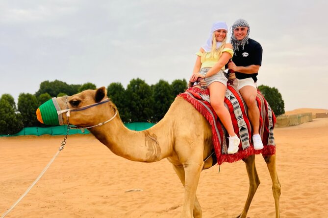 Dubai Desert Safari 20 mins Dune Bashing BBQ Live Show Camel Ride - Camel riding and sandboarding: short but worthwhile