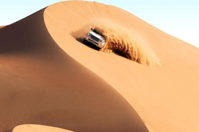 Dubai Desert Safari-BBQ Dinner, Belly Dance, Fire show - BBQ dinner under the evening sky
