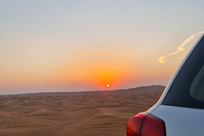 Dubai Desert Safari & Buffet Dinner and Camel ride with PRIVATE CAR - The shared Bedouin camp after dark