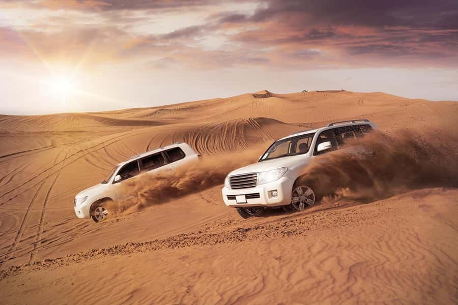 Dubai: Desert Safari, Camel Ride, and BBQ Dinner - From Dubai hotel pickup to open desert