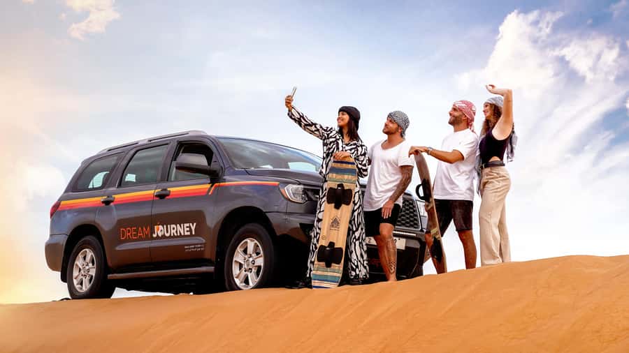 Dubai Desert Safari - Camel Ride, Sandboarding & 30 Min Quad - From Dubai hotels to the red dunes of Lahbab