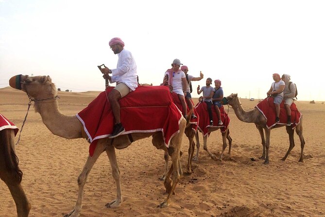Dubai: Desert Safari, Camel Ride, Show & Optional Dinner - Leaving Dubai for the red dunes