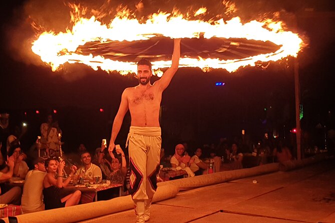Dubai: Desert Safari, Camel Ride, Show & Optional Dinner - Camp life, henna, falcons, and local dress
