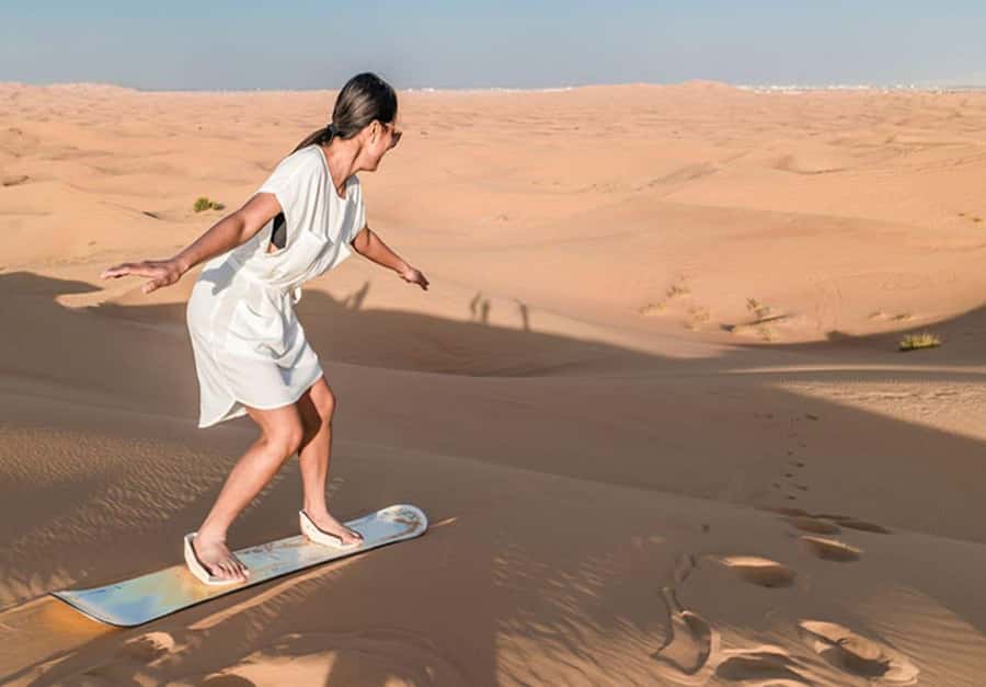 Dubai: Desert Safari Camel Riding, Sandboarding & BBQ Dinner - Pickup from Dubai and the road to the dunes